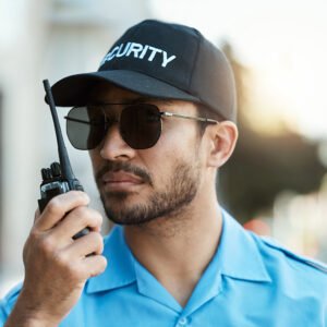 security guard safety officer or man with a walkie 347AQG5